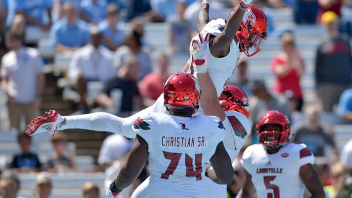 CHAPEL HILL, NC - SEPTEMBER 09: Dez Fitzpatrick #87 of the Louisville Cardinals celebrates with teammates after scoring a touchdown against the North Carolina Tar Heels during the game at Kenan Stadium on September 9, 2017 in Chapel Hill, North Carolina. (Photo by Grant Halverson/Getty Images)