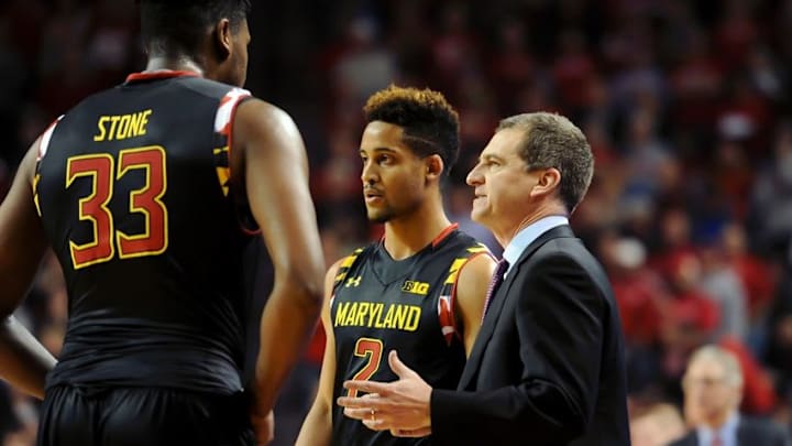 Feb 3, 2016; Lincoln, NE, USA; Maryland Terrapins head coach Mark Turgeon talks with guard Melo Trimble (2) and center Diamond Stone (33) during a break against the Nebraska Cornhuskers during the second half at Pinnacle Bank Arena. Maryland defeated Nebraska 70-65. Mandatory Credit: Steven Branscombe-USA TODAY Sports