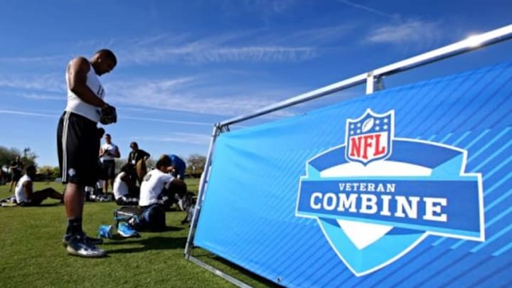 Mar 22, 2015; Tempe, AZ, USA; Defensive end Michael Sam (left) prepares to participate in drills during the NFL Veteran Combine at the Arizona Cardinals training facility. Mandatory Credit: Mark J. Rebilas-USA TODAY Sports