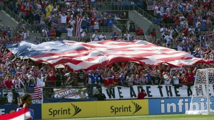 Jul 18, 2015; Baltimore, MD, USA; Fans unfurl a giant US flag before a game between the United States and the Cuba in a CONCACAF Gold Cup quarterfinal match at M&T Bank Stadium. The United States won 6-0. Mandatory Credit: Bill Streicher-USA TODAY Sports