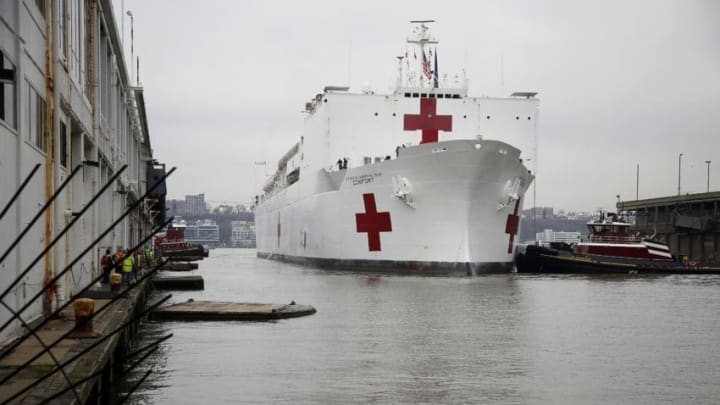 NEW YORK, NY - MARCH 30: The USNS Comfort arrives at Pier 90 on March 30, 2020 in New York City. The Comfort, a naval hospital ship, is equipped to take in patients within 24 hours but will not be treating patients with COVID-19. The ship's 1,000 beds and 12 operation rooms will help ease the pressure on New York hospitals, many of which are now overwhelmed with COVID-19 patients. (Photo by John Lamparski/Getty Images)