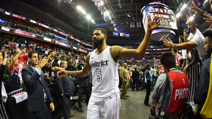 WASHINGTON, DC –  APRIL 22: Markieff Morris #5 of the Washington Wizards exchanges high fives with fans as he exits the arena after Game Four of Round One of the 2018 NBA Playoffs against the Toronto Raptors on April 22, 2018 at Capital One Arena in Washington, DC. NOTE TO USER: User expressly acknowledges and agrees that, by downloading and or using this Photograph, user is consenting to the terms and conditions of the Getty Images License Agreement. Mandatory Copyright Notice: Copyright 2018 NBAE (Photo by Jesse D. Garrabrant/NBAE via Getty Images)