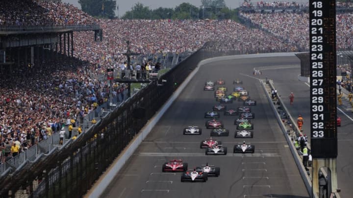 INDIANAPOLIS - MAY 30: Helio Castroneves of Brazil, driver of the #3 Team Penske Dallara Honda, leads the field at the start of the IZOD IndyCar Series 94th running of the Indianapolis 500 at the Indianapolis Motor Speedway on May 30, 2010 in Indianapolis, Indiana. (Photo by Robert Laberge/Getty Images)
