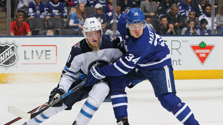 TORONTO, ON – MARCH 31: Patrik Laine #29 of the Winnipeg Jets skates against Auston Matthews #34 of the Toronto Maple Leafs. (Photo by Claus Andersen/Getty Images)