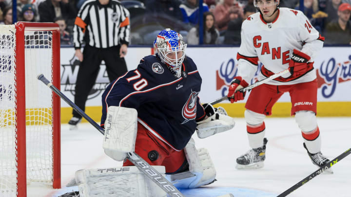 Jan 7, 2023; Columbus, Ohio, USA; Columbus Blue Jackets goaltender Joonas Korpisalo (70) makes a save in net against the Carolina Hurricanes in the first period at Nationwide Arena. Mandatory Credit: Aaron Doster-USA TODAY Sports