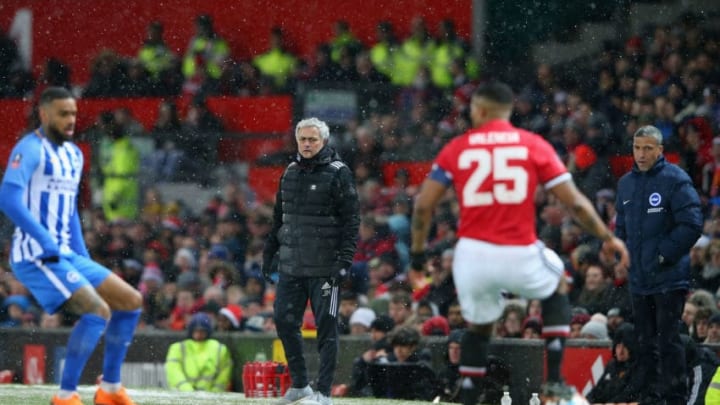MANCHESTER, ENGLAND - MARCH 17: Jose Mourinho the Manchester United manager and Chris Houghton the manager of Brighton watching the action during the Emirates FA Cup Quarter Final between Manchester United and Brighton