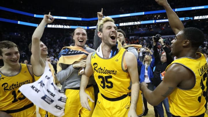 CHARLOTTE, NC - MARCH 16: The UMBC Retrievers bench reacts to their 74-54 victory over the Virginia Cavaliers during the first round of the 2018 NCAA Men's Basketball Tournament at Spectrum Center on March 16, 2018 in Charlotte, North Carolina. (Photo by Streeter Lecka/Getty Images)
