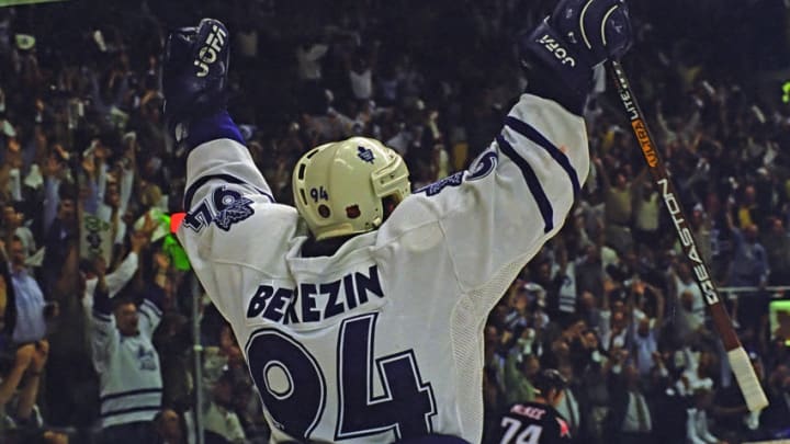 TORONTO, ON - MAY 23: Sergei Berezin #94 of the Toronto Maple Leafs celebrates against the Buffalo Sabres during the 1999 NHL Semi-Final playoff game action at Air Canada Centre in Toronto, Ontario, Canada. (Photo by Graig Abel/Getty Images)