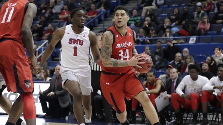 Mar 12, 2017; Hartford, CT, USA; Cincinnati Bearcats guard Jarron Cumberland (34) drives the ball against Southern Methodist Mustangs guard Shake Milton (1) in the second half of the championship game during the AAC Conference Tournament at XL Center. SMU defeated Cincinnati 71-56. Mandatory Credit: David Butler II-USA TODAY Sports