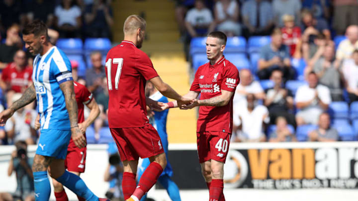CHESTER, ENGLAND - JULY 07: Ryan Kent of Liverpool celebrates scoring with Ragnar Klavan of Liverpool during the Pre-season friendly between Chester FC and Liverpool on July 7, 2018 in Chester, United Kingdom. (Photo by Lynne Cameron/Getty Images)