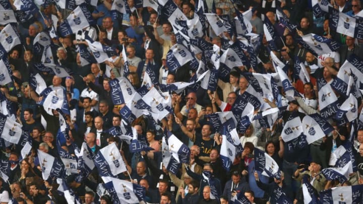LONDON, ENGLAND - MAY 14: Tottenham Hotspur fans wave their flags during the closing ceremony after the Premier League match between Tottenham Hotspur and Manchester United at White Hart Lane on May 14, 2017 in London, England. Tottenham Hotspur are playing their last ever home match at White Hart Lane after their 112 year stay at the stadium. Spurs will play at Wembley Stadium next season with a move to a newly built stadium for the 2018-19 campaign. (Photo by Clive Rose/Getty Images)