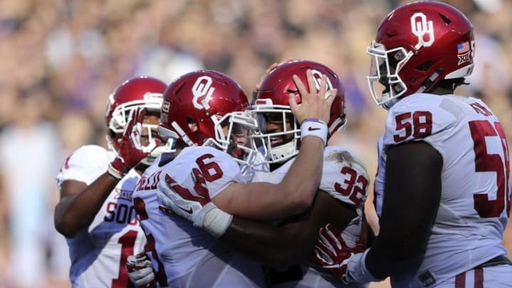 Oct 1, 2016; Fort Worth, TX, USA; Oklahoma Sooners quarterback Baker Mayfield (6) celebrates with running back Samaje Perine (32) during the game against the TCU Horned Frogs at Amon G. Carter Stadium. Mandatory Credit: Kevin Jairaj-USA TODAY Sports