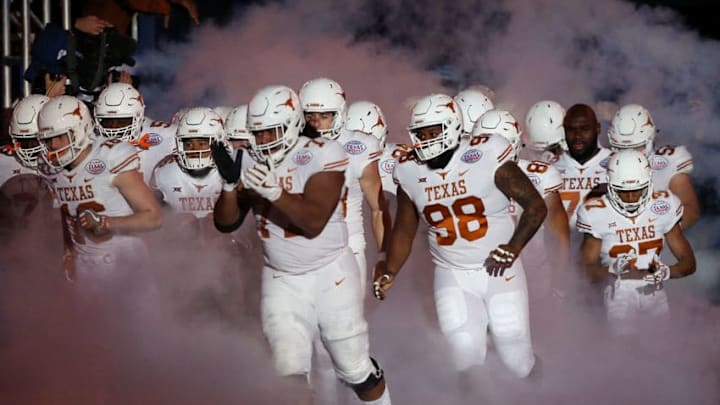 HOUSTON, TX - DECEMBER 27: The Texas Longhorns are introduced at NRG Stadium before the Academy Sports & Outdoors Bowl against the Missouri Tigers on December 27, 2017 in Houston, Texas. (Photo by Bob Levey/Getty Images)
