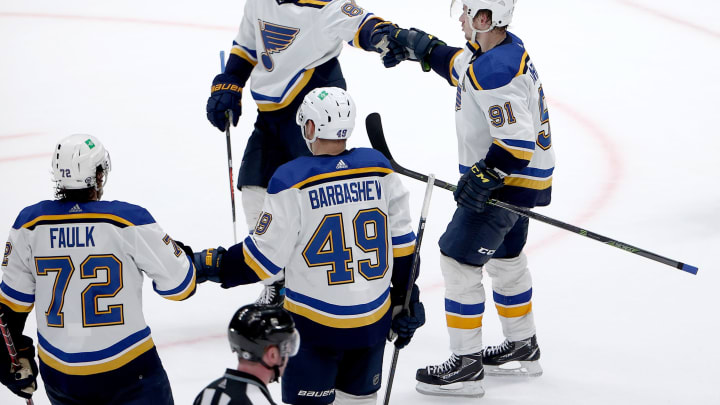 DALLAS, TEXAS – DECEMBER 14: Vladimir Tarasenko #91 of the St. Louis Blues celebrates with Pavel Buchnevich #89 of the St. Louis Blue, Justin Faulk #72 of the St. Louis Blues and Ivan Barbashev #49 of the St. Louis Blues after scoring a goal against the Dallas Stars in the third period at American Airlines Center on December 14, 2021 in Dallas, Texas. (Photo by Tom Pennington/Getty Images)