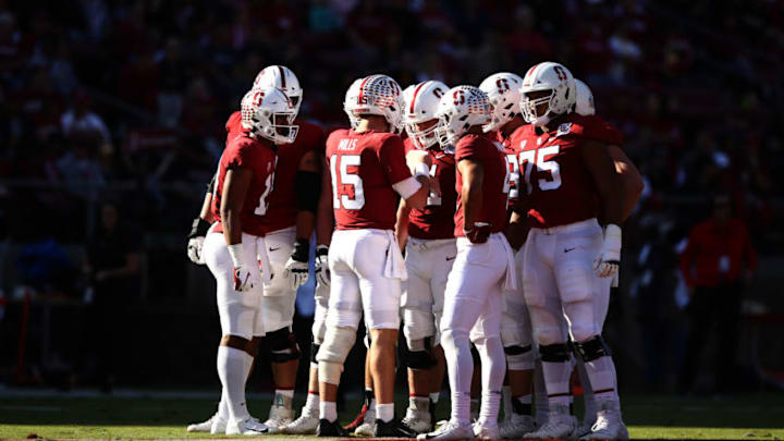 PALO ALTO, CALIFORNIA - NOVEMBER 23: Davis Mills #15 of the Stanford Cardinal huddles up his team against the California Golden Bears at Stanford Stadium on November 23, 2019 in Palo Alto, California. (Photo by Ezra Shaw/Getty Images)
