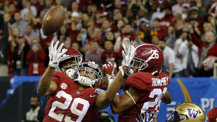 ATLANTA, GA – DECEMBER 31: Defensive back Minkah Fitzpatrick #29 of the Alabama Crimson Tide intercepts a pass in the fourth quarter in the 2016 CFP semifinal at the Peach Bowl at Georgia Dome on December 31, 2016 in Atlanta, Georgia. (Photo by Mike Zarrilli/Getty Images)