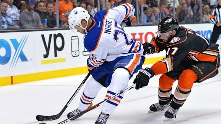 Nov 15, 2016; Anaheim, CA, USA; Edmonton Oilers defenseman Darnell Nurse (25) is defended by Anaheim Ducks center Ryan Kesler (17) during the second period at Honda Center. Mandatory Credit: Jake Roth-USA TODAY Sports