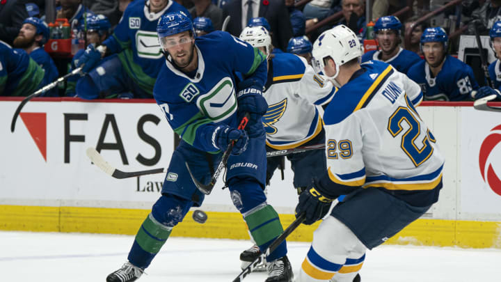 VANCOUVER, BC – NOVEMBER 05: Josh Leivo #17 of the Vancouver Canucks tries to shoot the puck past Vince Dunn #29 of the St. Louis Blues during NHL action at Rogers Arena on November 5, 2019 in Vancouver, Canada. (Photo by Rich Lam/Getty Images)