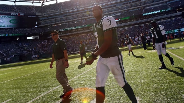Sep 28, 2014; East Rutherford, NJ, USA; New York Jets quarterback Geno Smith (7) walks off the field after the game against the Detroit Lions at MetLife Stadium. The Lions won 24-17. Mandatory Credit: Adam Hunger-USA TODAY Sports