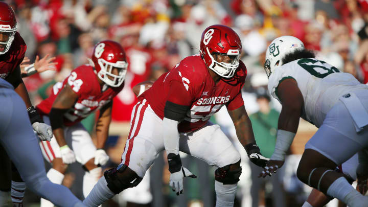 NORMAN, OK – NOVEMBER 5: Right guard Chris Murray #56 of the Oklahoma Sooners blocks against defensive lineman Siaki IkaHear #62 of the Baylor Bears in the fourth quarter at Gaylord Family Oklahoma Memorial Stadium on November 5, 2022 in Norman, Oklahoma. Baylor won 38-35. (Photo by Brian Bahr/Getty Images)