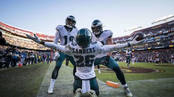 LANDOVER, MD - DECEMBER 15: Miles Sanders #26 of the Philadelphia Eagles celebrates with J.J. Arcega-Whiteside #19 and Dallas Goedert #88 after catching a pass for a touchdown against the Washington Redskins during the second half at FedExField on December 15, 2019 in Landover, Maryland. (Photo by Scott Taetsch/Getty Images)