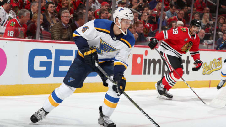 CHICAGO, IL - NOVEMBER 14: Carl Gunnarsson #4 of the St. Louis Blues controls the puck in the second period against the Chicago Blackhawks at the United Center on November 14, 2018 in Chicago, Illinois. The Chicago Blackhawks defeated the St. Louis Blues 1-0. (Photo by Chase Agnello-Dean/NHLI via Getty Images)