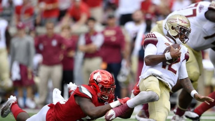 Sep 17, 2016; Louisville, KY, USA; Louisville Cardinals linebacker Jonathan Greenard (58) sacks Florida State Seminoles quarterback Deondre Francois (12) during the second half at Papa John's Cardinal Stadium. Louisville defeated Florida State 63-20. Mandatory Credit: Jamie Rhodes-USA TODAY Sports