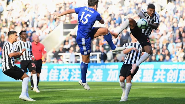 NEWCASTLE UPON TYNE, ENGLAND - SEPTEMBER 29: Newcastle player DeAndre Yedlin is adjuged to have handled this shot by Leicester player Harry Maguire to give Leicester a penalty during the Premier League match between Newcastle United and Leicester City at St. James Park on September 29, 2018 in Newcastle upon Tyne, United Kingdom. (Photo by Stu Forster/Getty Images)