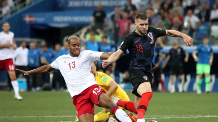 NIZHNY NOVGOROD, RUSSIA - JULY 01: Mathias Jorgensen of Denmark fouls Ante Rebic of Croatia to give Croatia a penalty during the 2018 FIFA World Cup Russia Round of 16 match between Croatia and Denmark at Nizhny Novgorod Stadium on July 1, 2018 in Nizhny Novgorod, Russia. (Photo by Julian Finney/Getty Images)