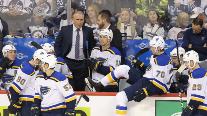 WINNIPEG, MANITOBA - APRIL 12: Head coach Craig Berube of the St. Louis Blues talks to his players during the third period of action against the Winnipeg Jets in Game Two of the Western Conference First Round during the 2019 NHL Stanley Cup Playoffs at Bell MTS Place on April 12, 2019 in Winnipeg, Manitoba, Canada. (Photo by Jason Halstead/Getty Images)