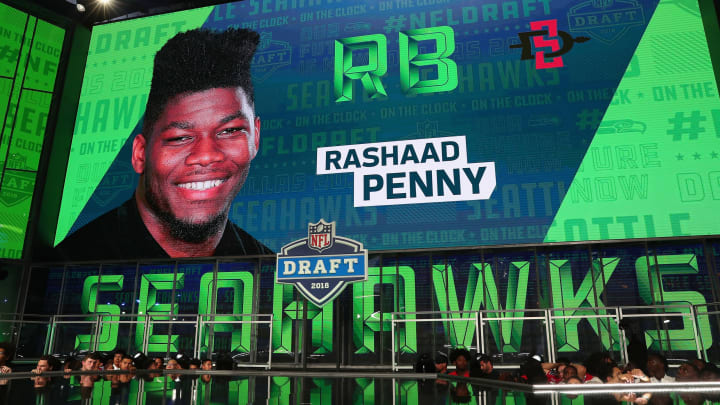 ARLINGTON, TX – APRIL 26: A video board displays an image of Rashaad Penny of San Diego State after he was picked #27 overall by the Seattle Seahawks during the first round of the 2018 NFL Draft at AT&T Stadium on April 26, 2018 in Arlington, Texas. (Photo by Tom Pennington/Getty Images)