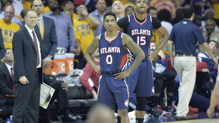 May 24, 2015; Cleveland, OH, USA; Atlanta Hawks guard Jeff Teague (0) looks on during a time out against the Cleveland Cavaliers in game three of the Eastern Conference Finals of the NBA Playoffs at Quicken Loans Arena. Mandatory Credit: David Richard-USA TODAY Sports