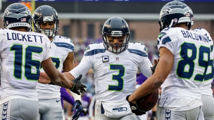 Dec 6, 2015; Minneapolis, MN, USA; Seattle Seahawks quarterback Russell Wilson (3) celebrates with teammates during the third quarter against the Minnesota Vikings at TCF Bank Stadium. The Seahawks defeated the Vikings 38-7. Mandatory Credit: Brace Hemmelgarn-USA TODAY Sports