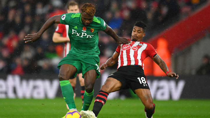 SOUTHAMPTON, ENGLAND - NOVEMBER 10: Mario Lemina of Southampton tackles Isaac Success of Watford during the Premier League match between Southampton FC and Watford FC at St Mary's Stadium on November 10, 2018 in Southampton, United Kingdom. (Photo by Harry Trump/Getty Images)