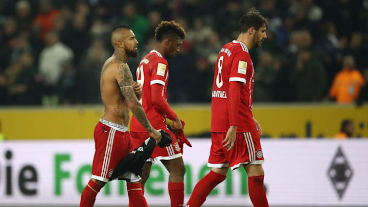 MOENCHENGLADBACH, GERMANY - NOVEMBER 25: (L-R:) Arturo Vidal of Bayern Muenchen, Kingsley Coman of Bayern Muenchen and Javi Martinez of Bayern Muenchen leave the pitch dejected after the Bundesliga match between Borussia Moenchengladbach and FC Bayern Muenchen at Borussia-Park on November 25, 2017 in Moenchengladbach, Germany. (Photo by Maja Hitij/Bongarts/Getty Images)