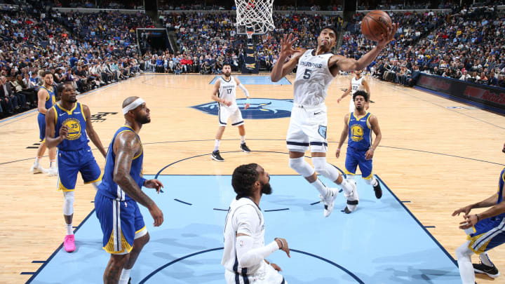 MEMPHIS, TN – MARCH 27: Bruno Caboclo #5 of the Memphis Grizzlies shoots the ball against the Golden State Warriors on March 27, 2019 at FedExForum in Memphis, Tennessee. NOTE TO USER: User expressly acknowledges and agrees that, by downloading and or using this photograph, User is consenting to the terms and conditions of the Getty Images License Agreement. Mandatory Copyright Notice: Copyright 2019 NBAE (Photo by Joe Murphy/NBAE via Getty Images)