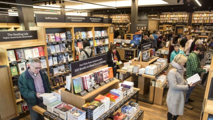 SEATTLE, WA - NOVEMBER 4: Customers browse books at the newly opened Amazon Books store on November 4, 2015 in Seattle, Washington. The online retailer opened its first brick-and-mortar book store on November 3, 2015. (Photo by Stephen Brashear/Getty Images)