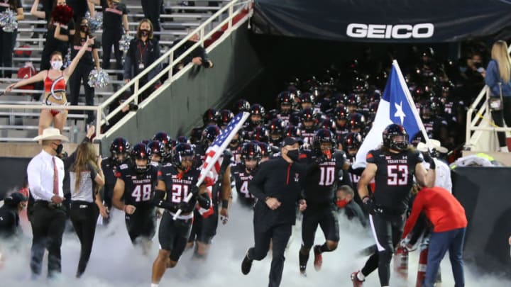 Oct 31, 2020; Lubbock, Texas, USA; Texas Tech Red Raiders head coach Matt Wells leads the team onto the field before the game against the Oklahoma Sooners at Jones AT&T Stadium. Mandatory Credit: Michael C. Johnson-USA TODAY Sports