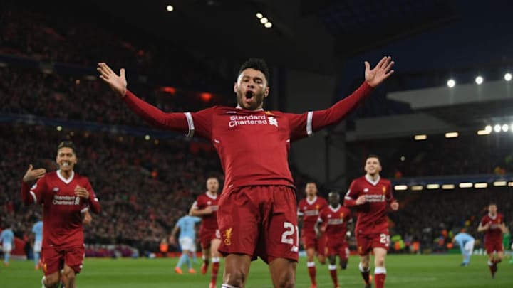 LIVERPOOL, ENGLAND - APRIL 04: Alex Oxlade-Chamberlain of Liverpool celebrates after scoring his sides second goal during the UEFA Champions League Quarter Final Leg One match between Liverpool and Manchester City at Anfield on April 4, 2018 in Liverpool, England. (Photo by Shaun Botterill/Getty Images)