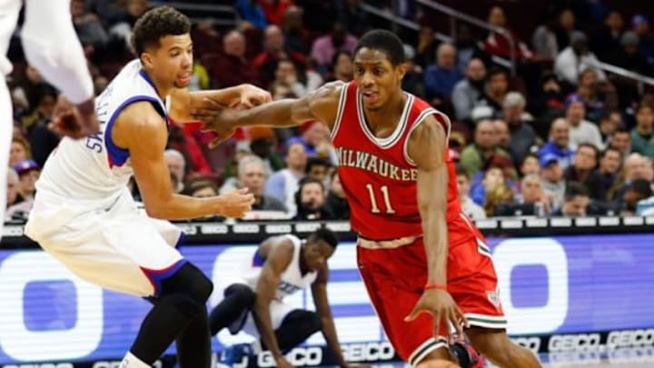 Jan 7, 2015; Philadelphia, PA, USA; Milwaukee Bucks guard Brandon Knight (11) drives past Philadelphia 76ers guard Michael Carter-Williams (1) during the second half at Wells Fargo Center. The Bucks defeated the 76ers 97-87. Mandatory Credit: Bill Streicher-USA TODAY Sports