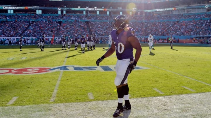 Dec 7, 2014; Miami Gardens, FL, USA; Baltimore Ravens outside linebacker Albert McClellan (50) walks off the field during the second half against the Miami Dolphins at Sun Life Stadium. Ravens won 28-13. Mandatory Credit: Steve Mitchell-USA TODAY Sports
