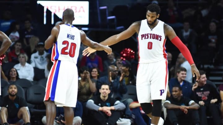 Oct 21, 2015; Auburn Hills, MI, USA; Detroit Pistons center Andre Drummond (0) high fives guard Jodie Meeks (20) during the game against the Charlotte Hornets at The Palace of Auburn Hills. Charlotte won 99-94. Mandatory Credit: Tim Fuller-USA TODAY Sports