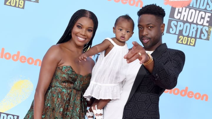Gabrielle Union, Kaavia James Union Wade, and Dwyane Wade attend Nickelodeon Kids' Choice Sports 2019 (Photo by Gregg DeGuire/WireImage)