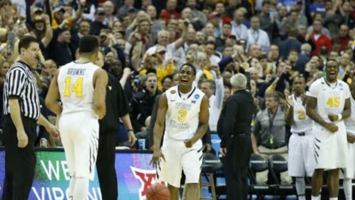 Mar 20, 2015; Columbus, OH, USA; West Virginia Mountaineers guard Juwan Staten (3) reacts after the game against the Buffalo Bulls in the second round of the 2015 NCAA Tournament at Nationwide Arena. West Virginia won 68-62. Mandatory Credit: Greg Bartram-USA TODAY Sports