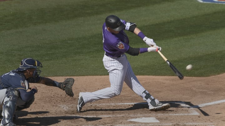 SCOTTSDALE, AZ – MARCH 3: Colorado Rockies shortstop Trevor Story (27) hits a homer to center field in the third inning against the Milwaukee Brewers on March 3, 2018 at Salt River Fields at Talking Stick. (Photo by John Leyba/The Denver Post via Getty Images)