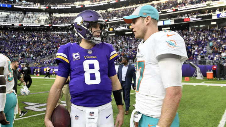 MINNEAPOLIS, MN - DECEMBER 16: Kirk Cousins #8 of the Minnesota Vikings and Ryan Tannehill #17 of the Miami Dolphins speak after the game at U.S. Bank Stadium on December 16, 2018 in Minneapolis, Minnesota. The Vikings defeated the Dolphins 41-17. (Photo by Hannah Foslien/Getty Images)