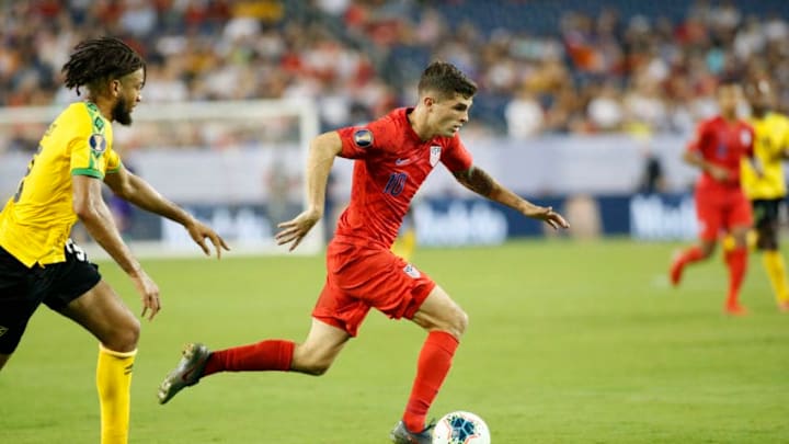 NASHVILLE, TN - JULY 03: United States forward Christian Pulisic (10) pushes the ball during the CONCACAF Gold Cup semifinal soccer game between the United States and Jamaica, July 3, 2019 at Nissan Stadium in Nashville, Tennessee. (Photo by Matthew Maxey/Icon Sportswire via Getty Images)