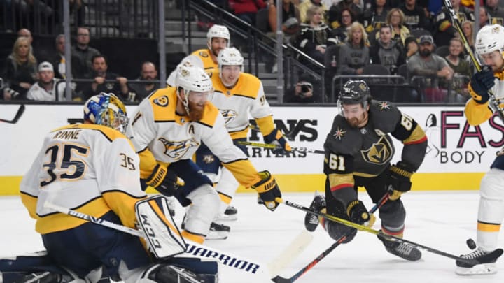 Ryan Ellis #4 of the Nashville Predators knocks the puck away from Mark Stone #61 of the Vegas Golden Knights. (Photo by Ethan Miller/Getty Images)