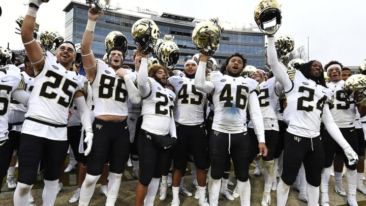 DURHAM, NORTH CAROLINA – NOVEMBER 24: The Wake Forest Demon Deacons celebrate their victory over the Duke Blue Devils following their football game at Wallace Wade Stadium on November 24, 2018 in Durham, North Carolina. (Photo by Mike Comer/Getty Images)