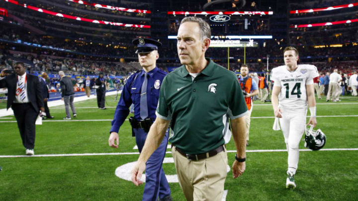 ARLINGTON, TX - DECEMBER 31: Head coach Mark Dantonio walks off the field after losing 38-0 to the Alabama Crimson Tide during the Goodyear Cotton Bowl at AT&T Stadium on December 31, 2015 in Arlington, Texas. (Photo by Scott Halleran/Getty Images)